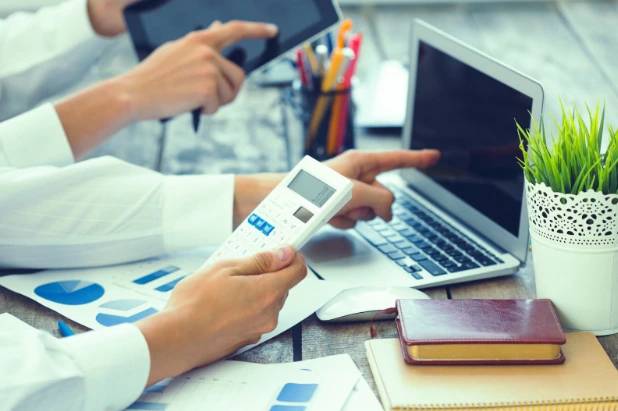 Bookkeepers Reconciling Bank Accounts